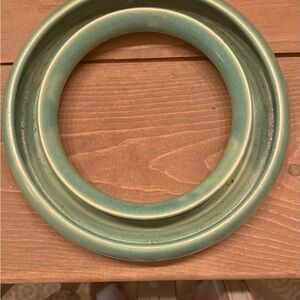 Green Ceramic Pansy ring flower vase.  Signed on back Peterson